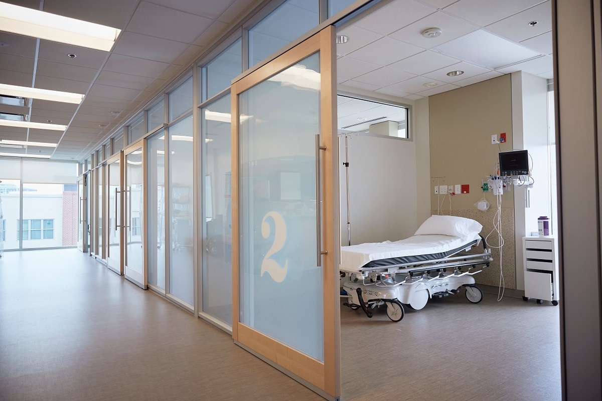 Empty hospital hallway and room
